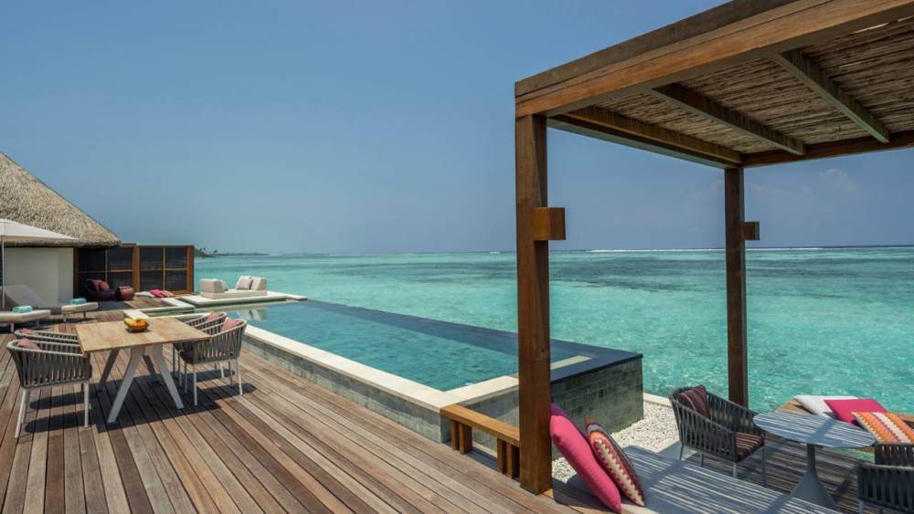 content/hotel/Four Seasons Kuda Huraa/Accommodation/Sunrise 2 Bedroom Water Suite/FSKudaHuraa-Acc-Sunrise2BWaterSuite-01.jpg